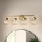 Designers Fountain Knoll 33in 4-Light Brushed Gold Retro Modern Indoor Vanity Light with Clear Glass Shades 95904-BG - alternate 2